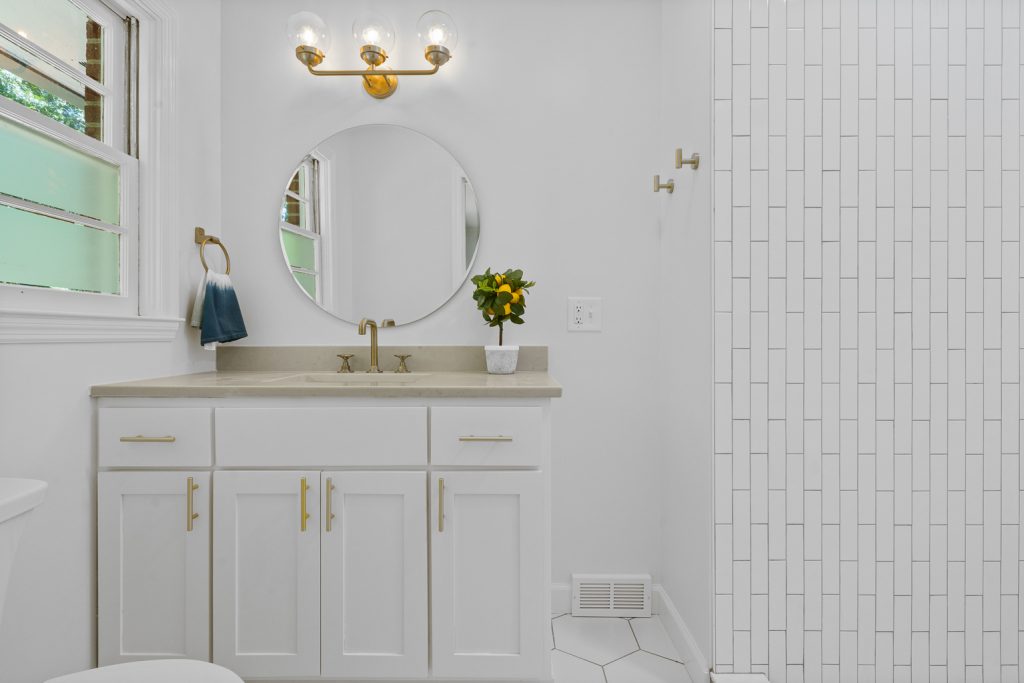 Brick ranch renovation: small primary bathroom
